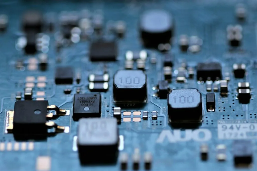 Close-up of a printed circuit board containing precious and base metals recovered from e-waste